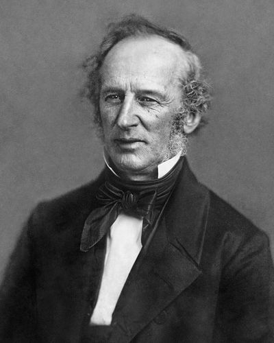 Daguerreotype of Cornelius Vanderbilt, grey-haired, in a dark coat and high white collar